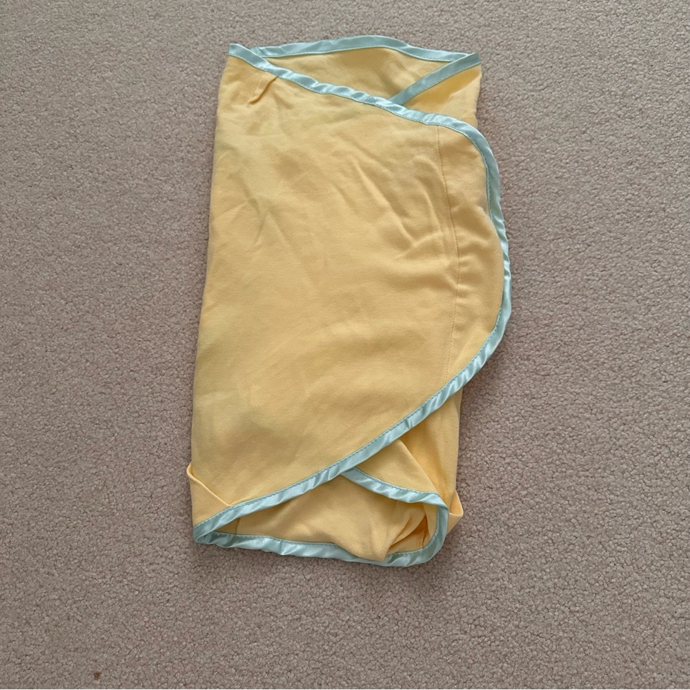 The First Years Yellow Baby Swaddle (newborn)